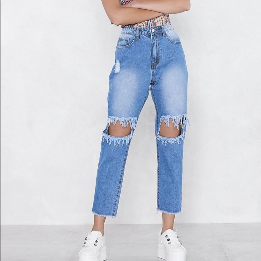 Distressed blue jeans
